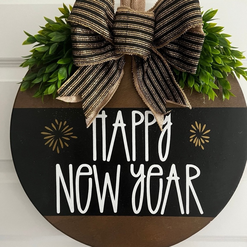 Festive New Year Wreath with Gold and Black Bow